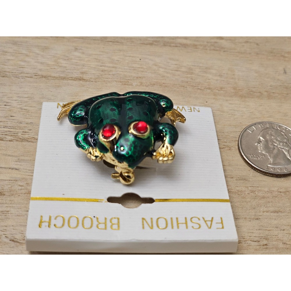 Vintage Frog fashion Brooch with red rhinestone eyes.
